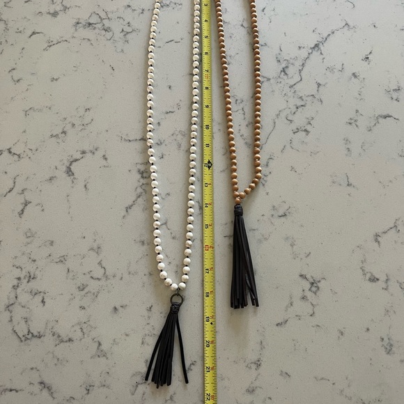 Two Brand New diffuser necklaces with leather tassels and never used. - Picture 2 of 2